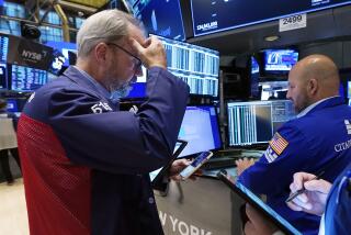 Trader David O'Day, left, and specialist John Parisi work on the floor of the New York Stock Exchange, Wednesday, Sept. 13, 2023. Stocks are churning in place on Wall Street after a highly anticipated report showed inflation accelerated across the country last month, but not by much more than expected. (AP Photo/Richard Drew)