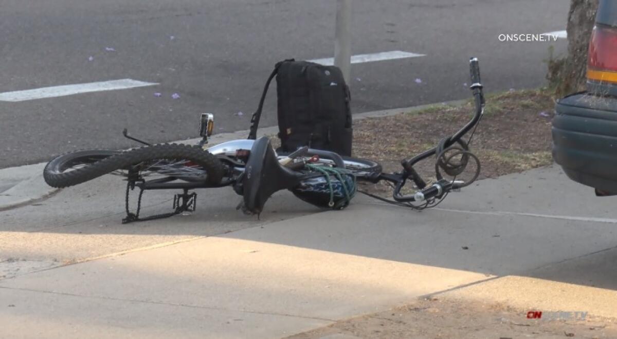A bicycle lies mangled on the ground after its rider was struck and killed in 2021 in Clairemont.