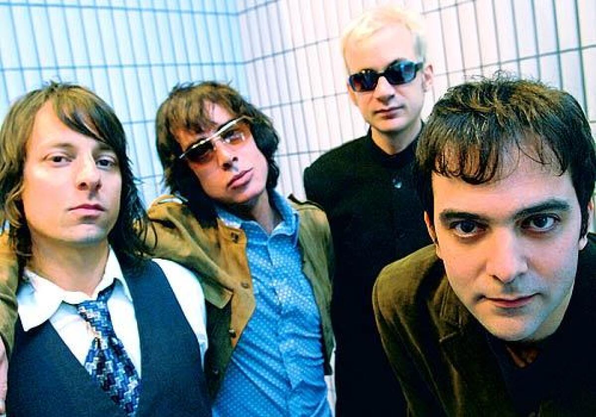 Fountains of Wayne reunited Wednesday to honor the late Adam Schlesinger, far right.