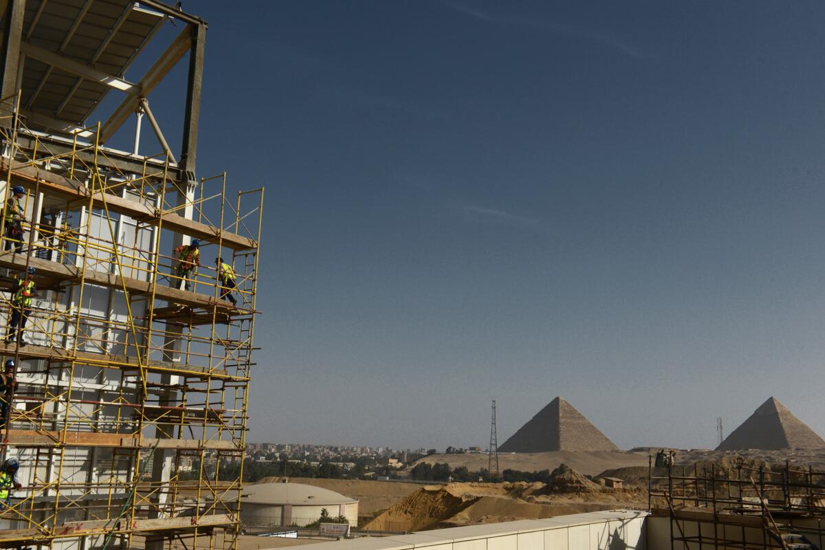 Construction continues on the Grand Egyptian Museum, down the road from the Great Pyramids of Giza.