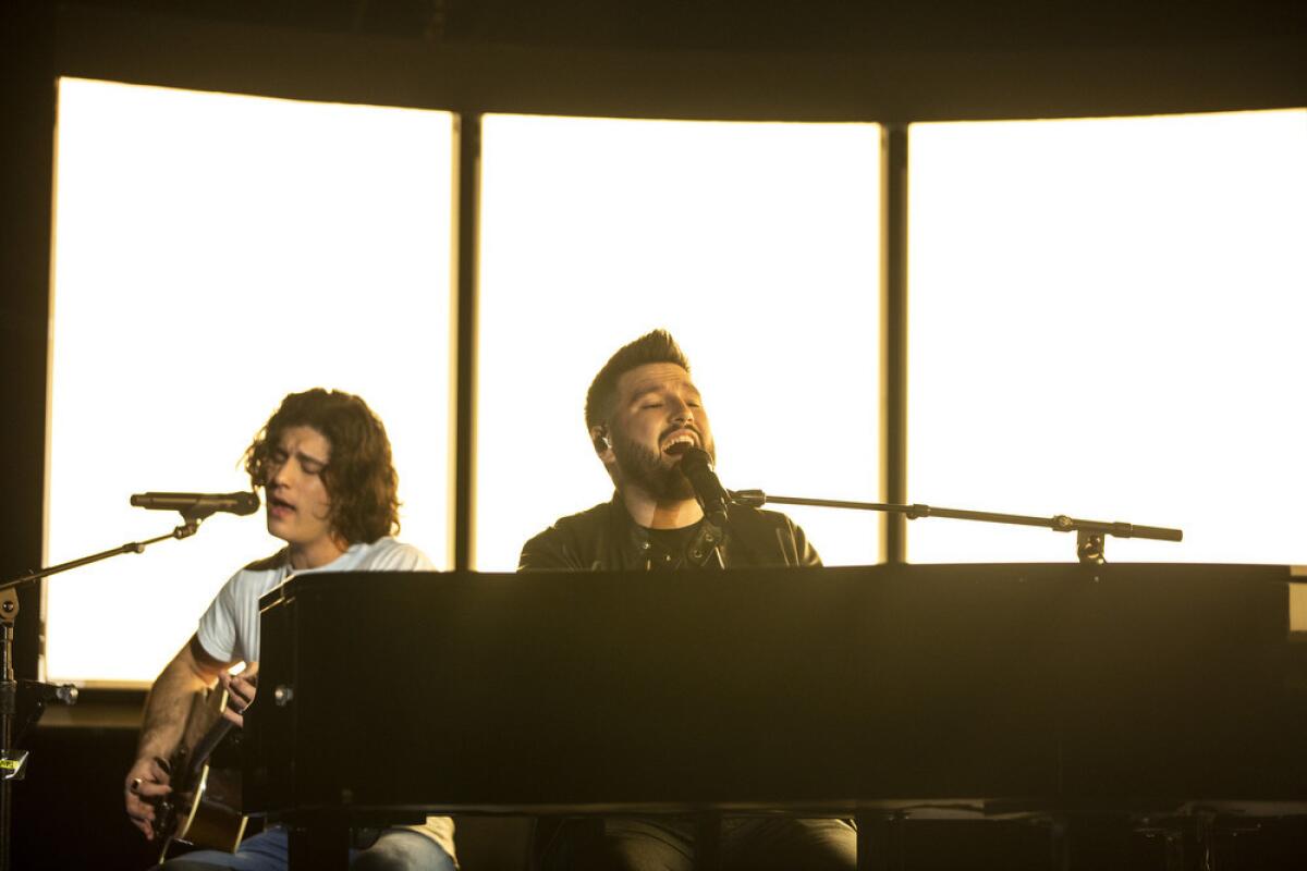 Dan Smyers and Shay Mooney of Dan + Shay rehearse onstage for the 61st Annual Grammy Awards show at Staples Center on Thursday.