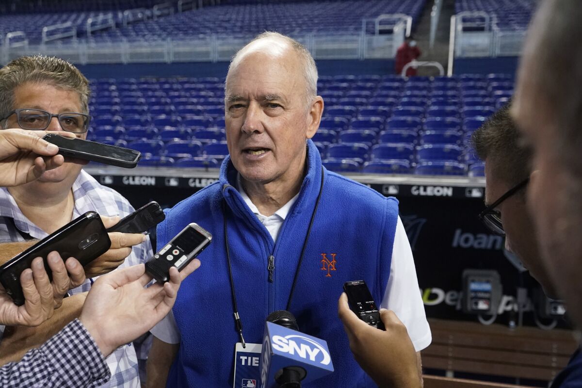 FILE - New York Mets president and general manager Sandy Alderson speaks to members of the media before the start of a baseball game between the Miami Marlins and the Mets, Tuesday, Sept. 7, 2021, in Miami. Acting general manager Zack Scott will not return to the New York Mets after being placed on administrative leave following an arrest on drunken driving charges in August, according to a person familiar with the firing. President Sandy Alderson assumed GM duties with Scott on paid leave and already oversaw the firing of manager Luis Rojas. (AP Photo/Wilfredo Lee, File)