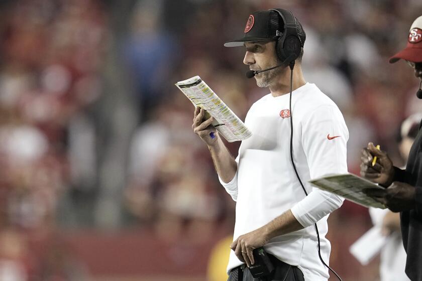 San Francisco 49ers head coach Kyle Shanahan watches from the sideline during the second half of an NFL football game against the New York Giants in Santa Clara, Calif., Thursday, Sept. 21, 2023. (AP Photo/Godofredo A. Vásquez)