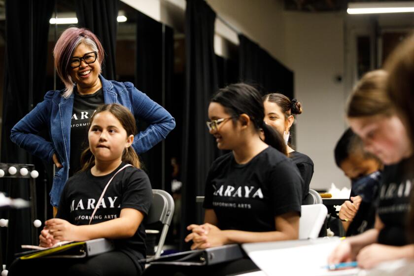 Anjanette Maraya-Ramey smiles during rehearsal for “The Grunch” at her studio, Maraya Performing Arts, in Chula Vista on Sept. 27, 2023.