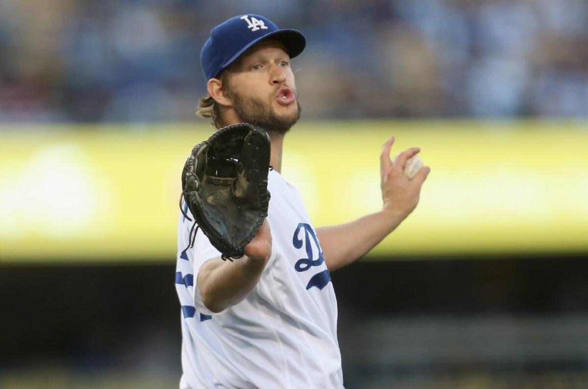 Dodgers ace Clayton Kershaw complains to umpire Joe West after getting called for a balk during the second inning of a game against the Braves on June 4.