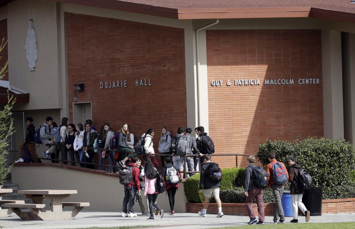 Students outside Saint Francis High School.