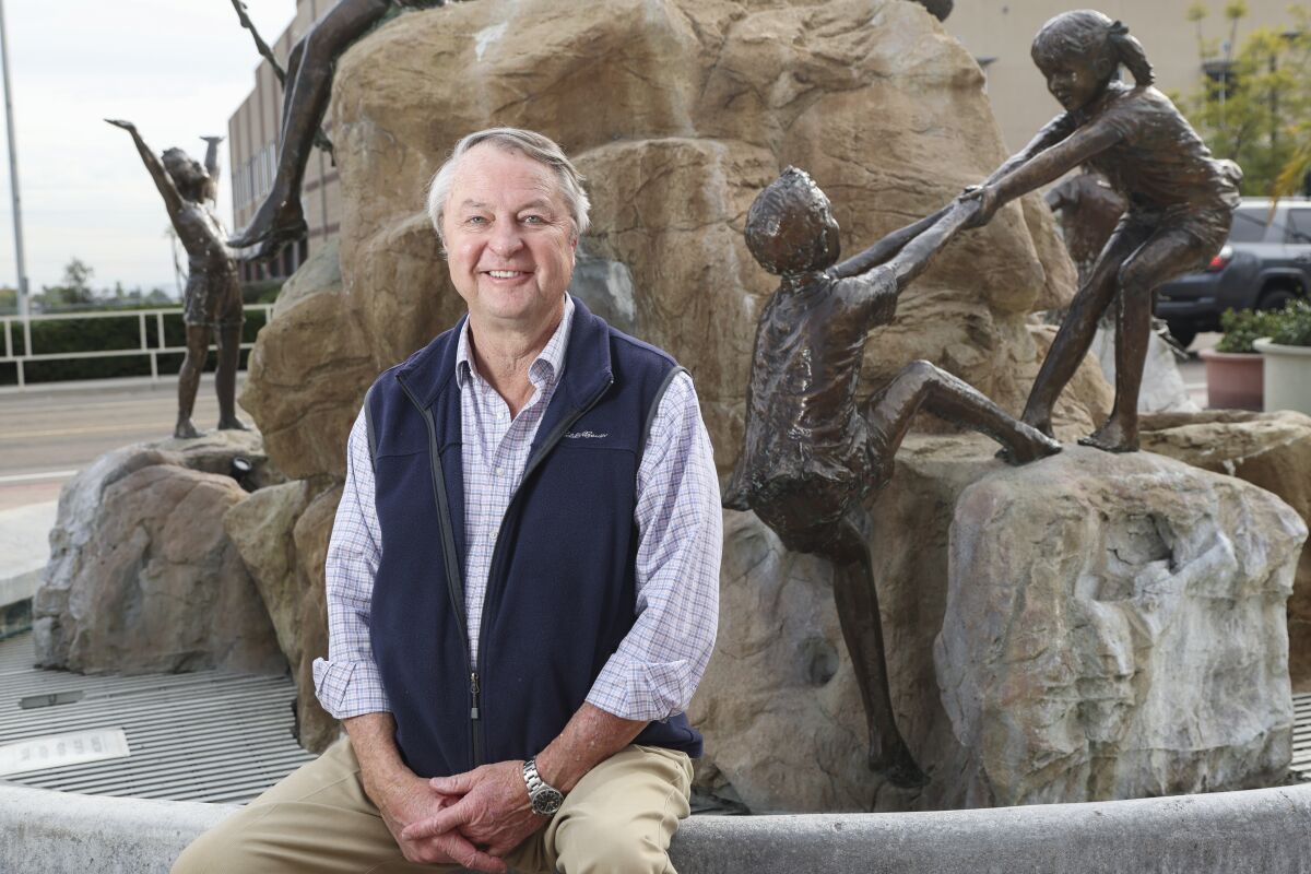 Author and adventurer Wayne Raffesberger is shown in front of the fountain at Rady Children's Hospital.