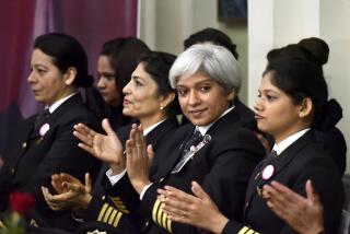 NEW DELHI, INDIA - MARCH 7: The commander of an all women Air India, the country's state owned carrier's Delhi San Francisco Delhi flight, Kshamta Bajpai, (2R), with other pilots cheers her crew during the celebration ceremony at a function on the eve of international women's day on March 7, 2017 in New Delhi, India. Air India says it has set a world record by flying around the world with an all-female crew. Press Trust of India reported that the flight flew over the Pacific Ocean from New Delhi to San Francisco on Monday, and then flew back to New Delhi over the Atlantic on Friday(Photo by Vipin Kumar/Hindustan Times via Getty Images)
