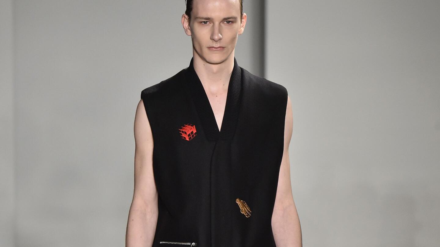 An embroidered sleeveless coat from Tim Coppen's fall collection.