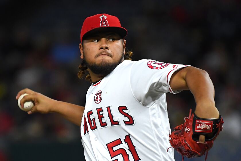 ANAHEIM, CA - SEPTEMBER 26: Jaime Barria #51 of the Los Angeles Angels pitches in the second inning of the game against the Houston Astros at Angel Stadium on September 26, 2019 in Anaheim, California. (Photo by Jayne Kamin-Oncea/Getty Images)