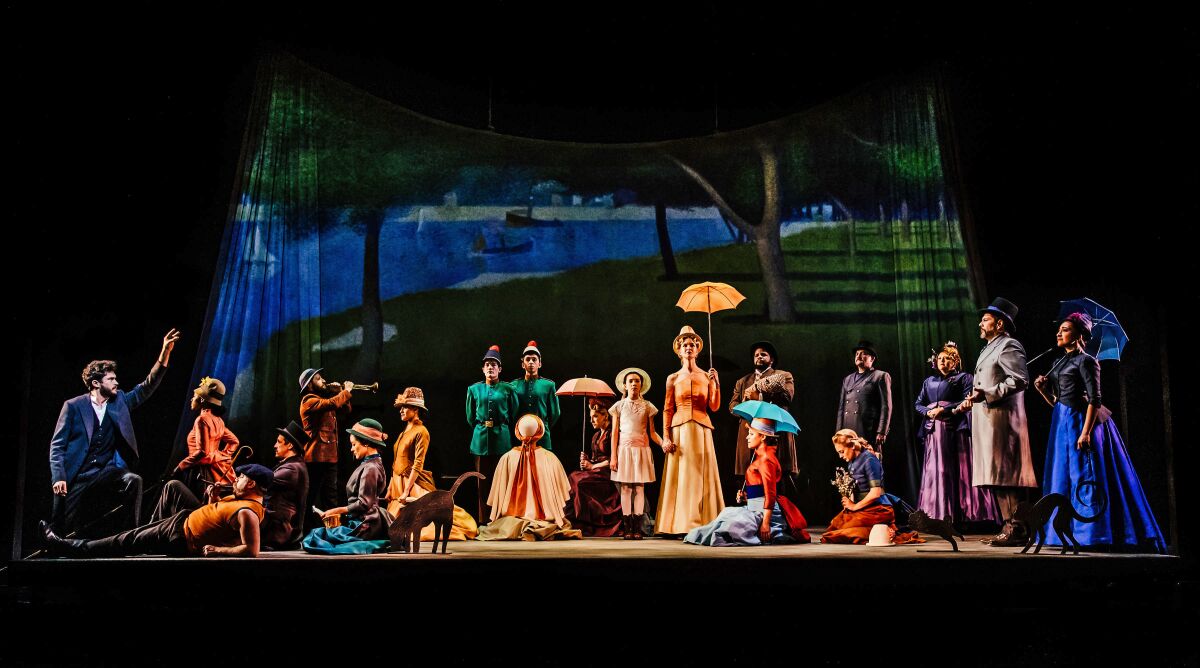 Actors on a stage re-create a famous Georges Seurat painting.