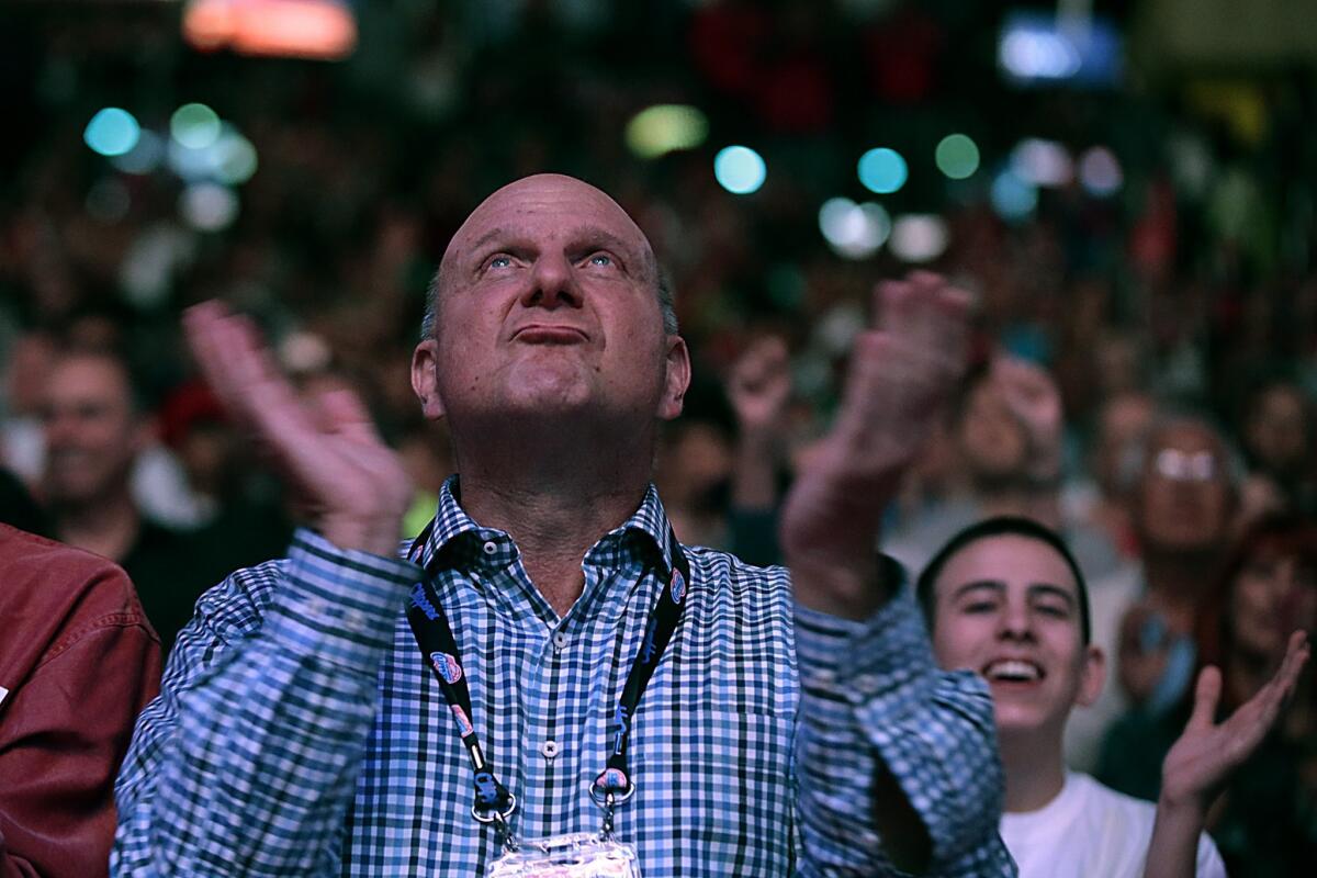 Clippers Owner Steve Ballmer sits courtside before his team's season opener against the Oklahoma City Thunder on Oct. 30.