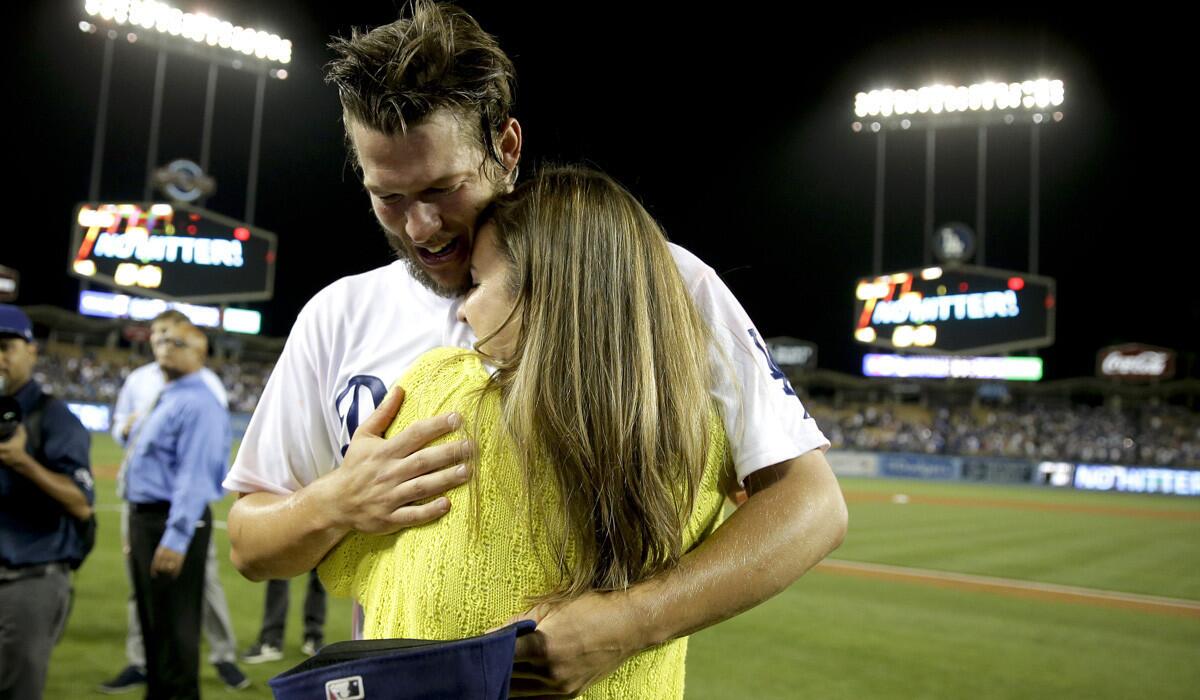 Clayton Kershaw celebrates his no-hitter in 2014 with wife Ellen at Dodger Stadium.