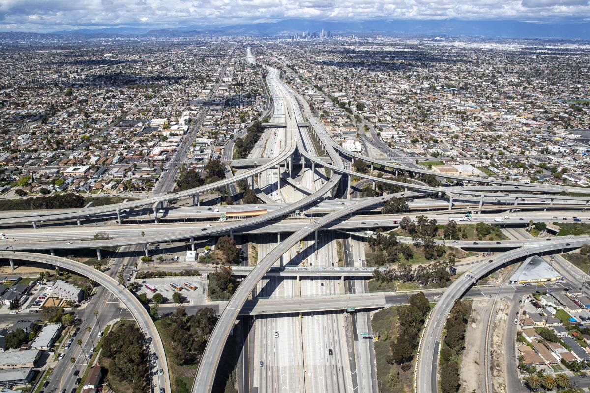 Aerial view of the nearly empty 110 and 105 freeway interchange early in the pandemic.