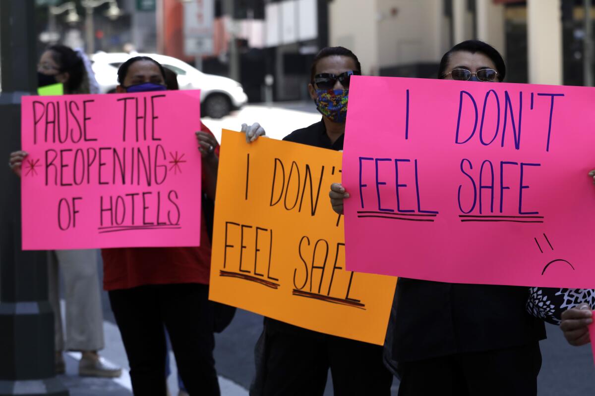 Hotel workers protest for their safety downtown on July 8 in Los Angeles