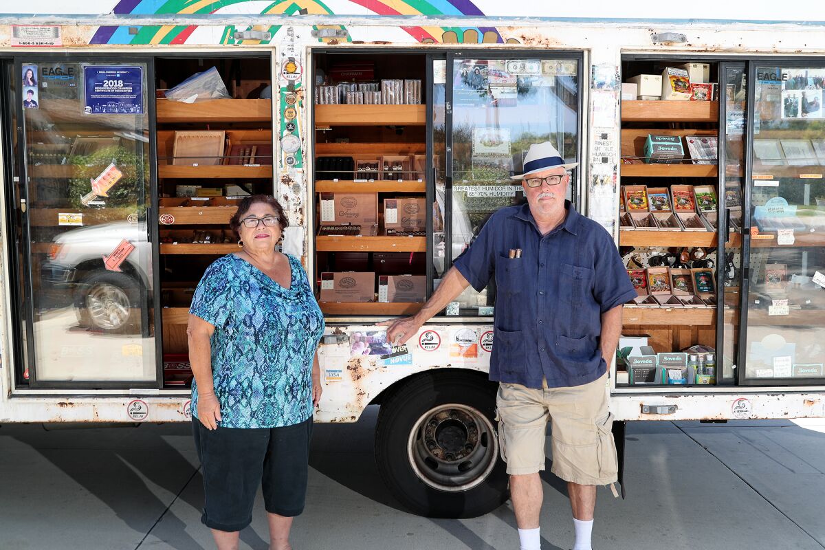 Anaheim couple Jeanine and Mike Robbins, owners of Paradise Cigars.