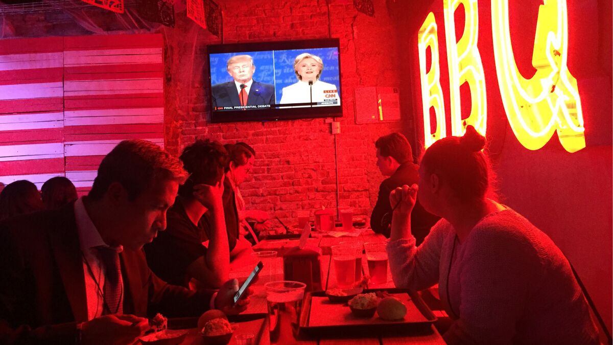 Patrons at a Mexico City restaurant watch the final presidential debate.