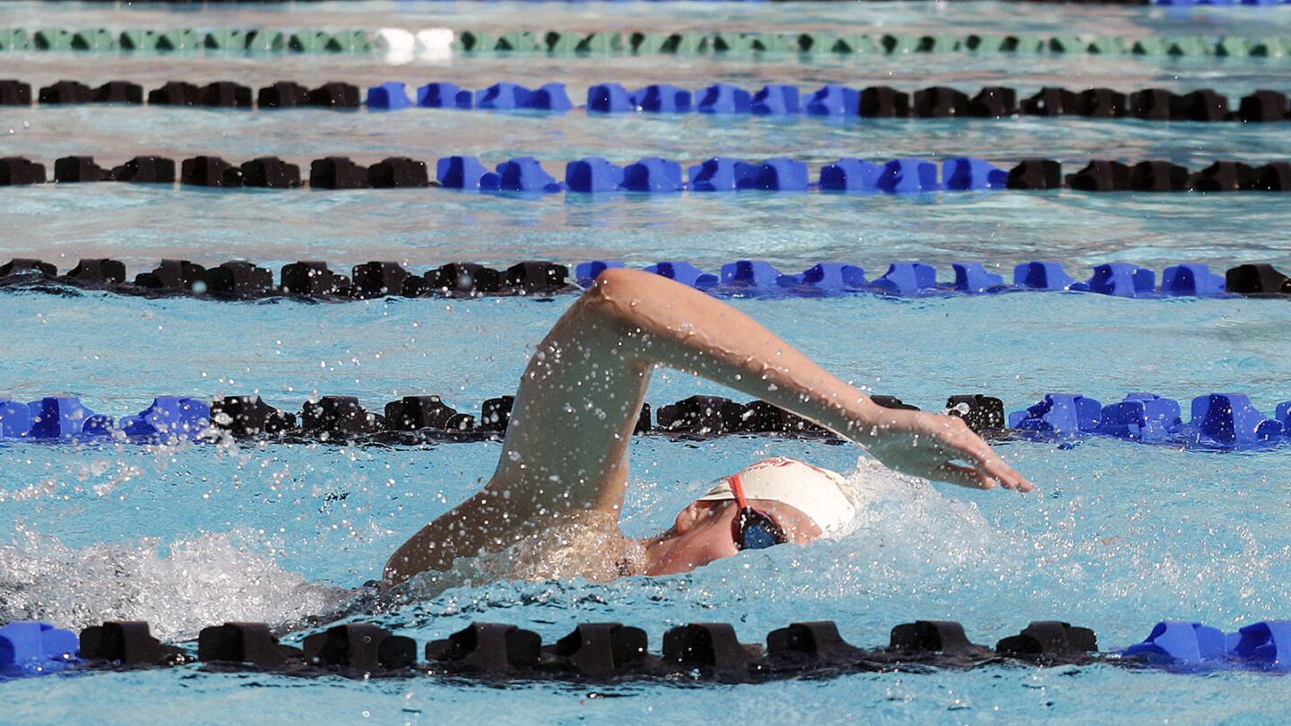 Burroughs Maya Wilson, all alone, and on the way to a win and Pacific League record in the girls 200 yard freestylein the Pacific League swim finals at Burbank High School on Thursday, May 3, 2018.