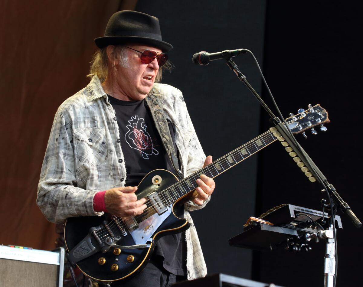  2019/07/12: Neil Young performs on stage at London's Hyde Park. 