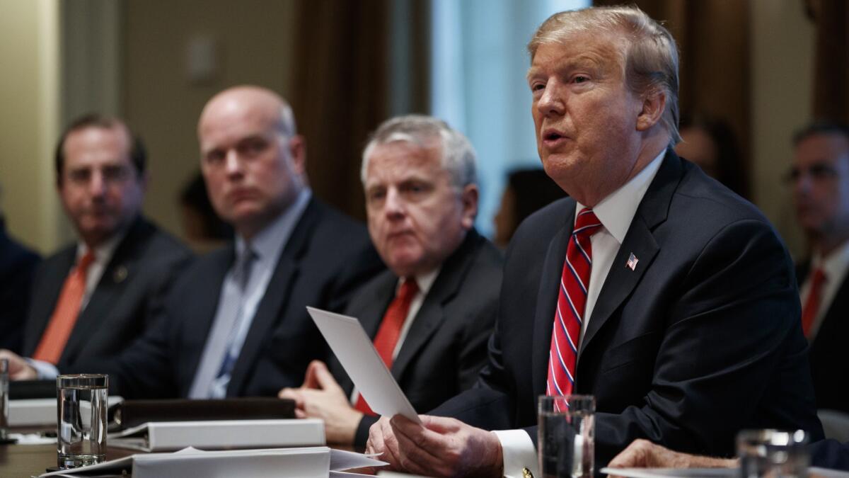 President Trump speaks during a cabinet meeting in Washington on Feb. 12.
