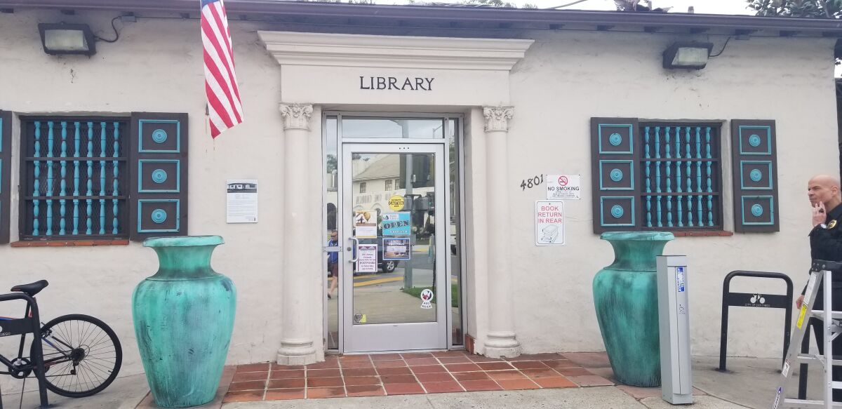The historical plaque at OB Library can be seen on the left of the library’s entrance.