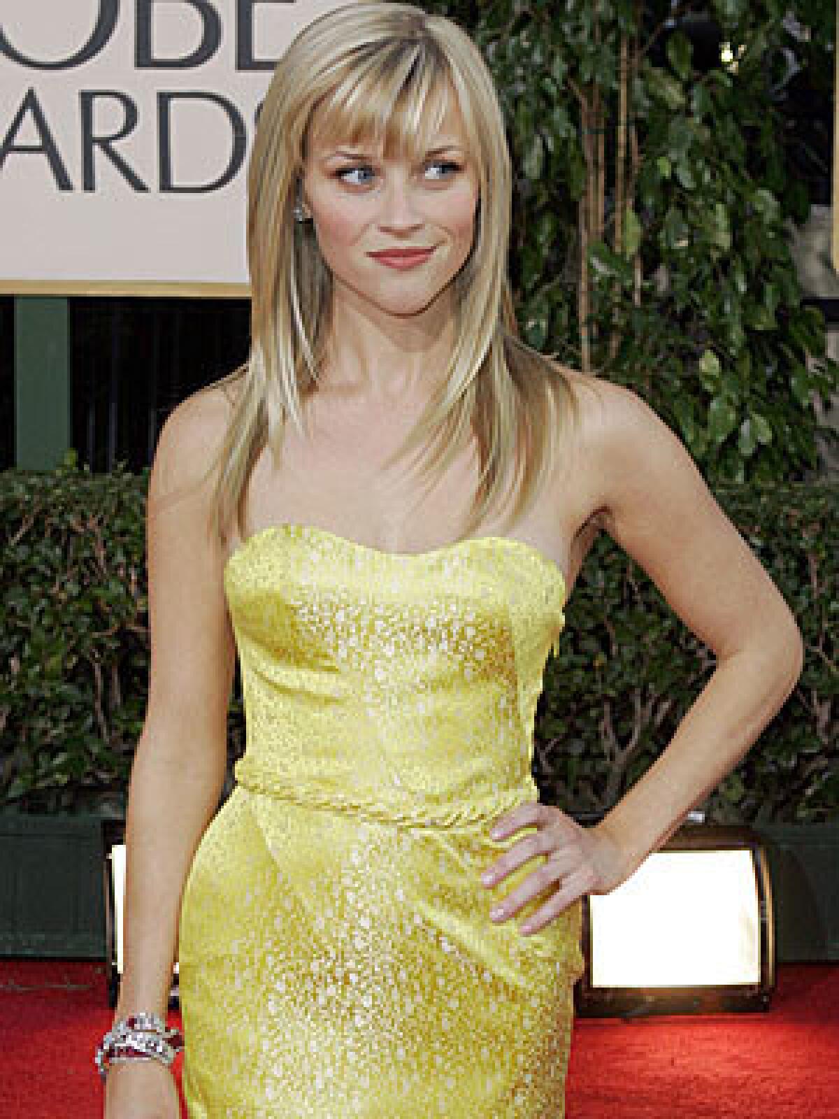 Reese Witherspoons gem-free neck from 07 looks oh-so-2009.