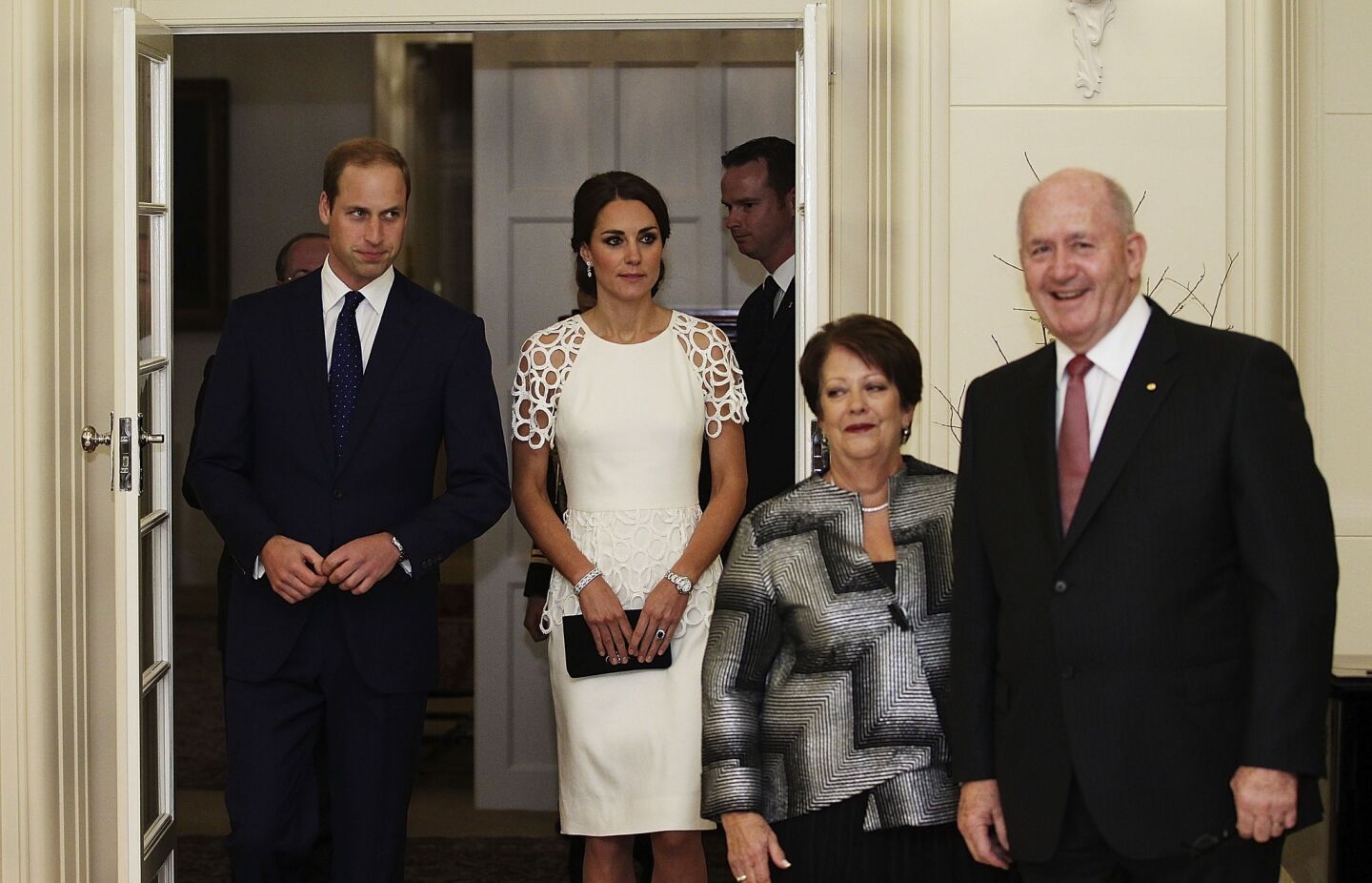 The duke and duchess arrive at a reception at Government House behind their hosts, Governor-General Peter Cosgrove and his wife.