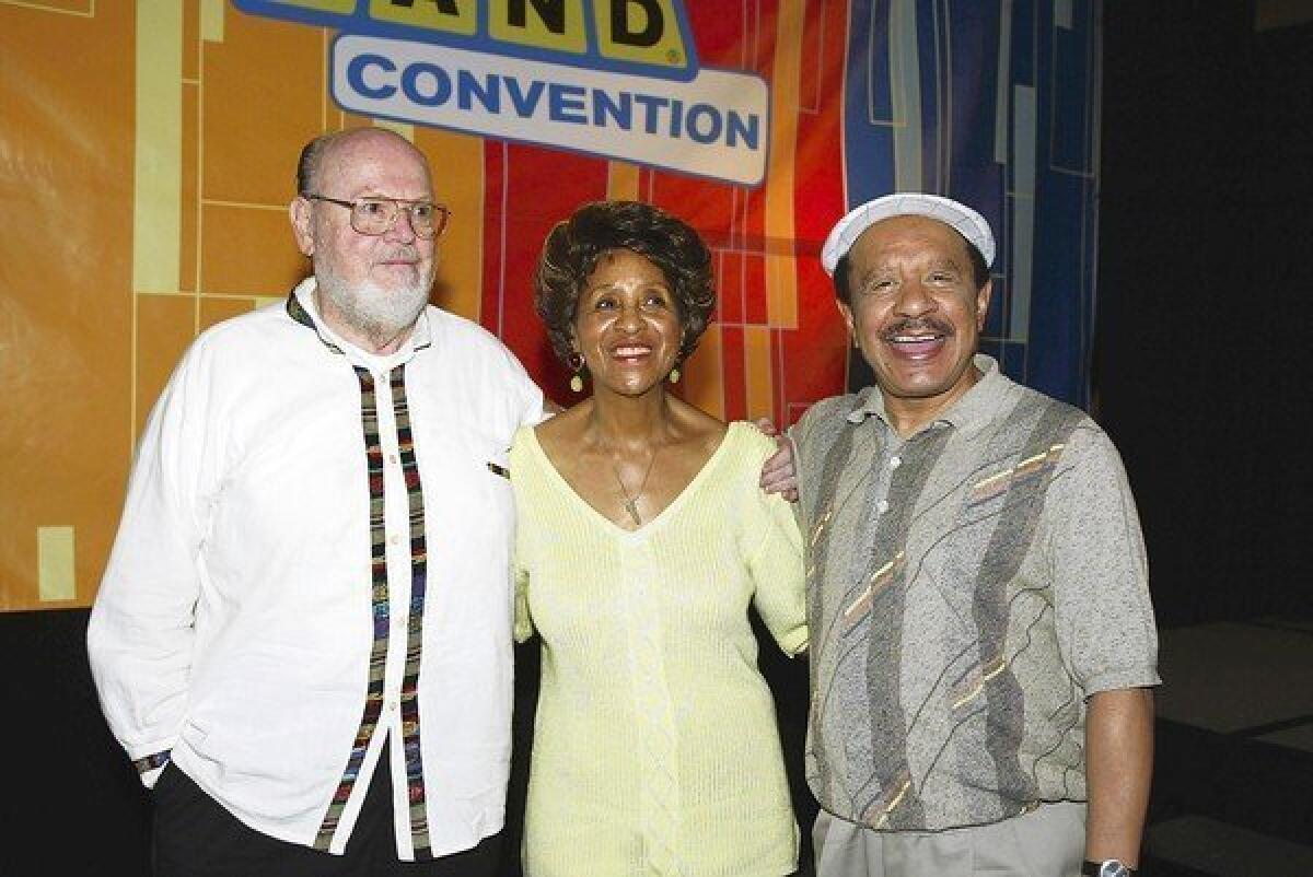 Actor Ned Wertimer, left, who played Ralph the doorman on "The Jeffersons," poses with Marla Gibbs and Sherman Hemsley in 2003.
