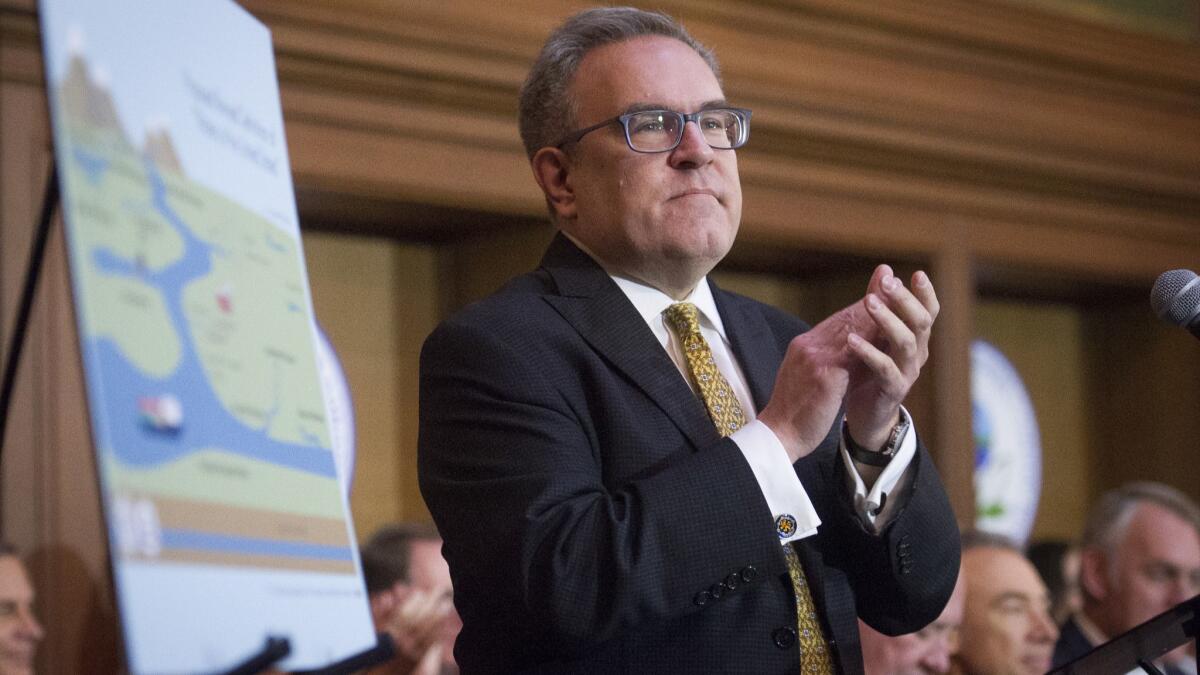 Acting Environmental Protection Agency Administrator Andrew Wheeler speaks at EPA headquarters in Washington on Dec. 11 after signing an order withdrawing federal protections for thousands of miles of waterways and wetlands.