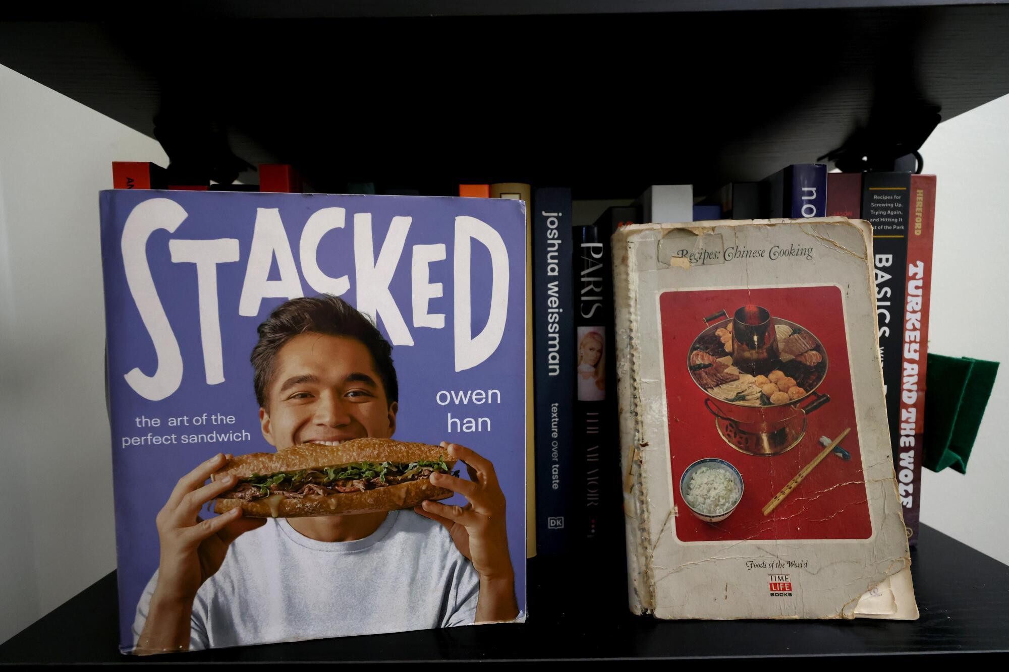 Food content creator Owen Han's book rests next to his Chinese grandmother's cookbook.