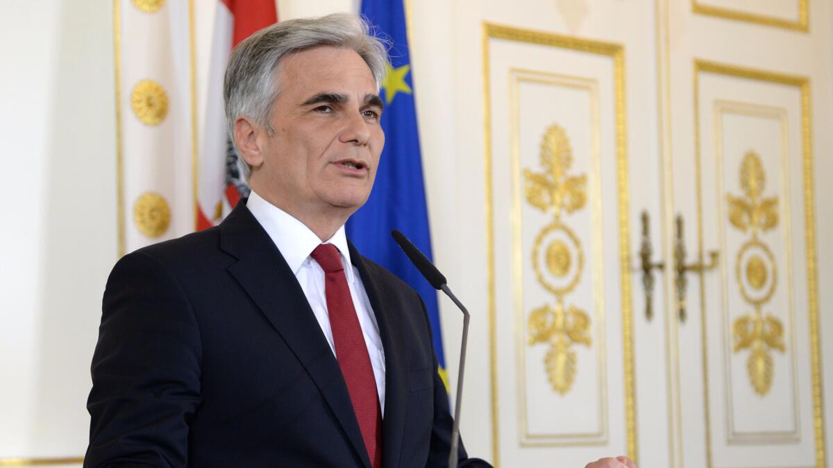 Werner Faymann announces his resignation as Austrian chancellor and leader of the Social Democratic Party during a press conference on May 9, 2016, in Vienna.