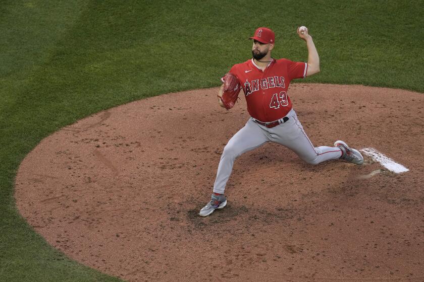 Angels pitcher Patrick Sandoval delivers during the fourth inning against the Kansas City Royals on June 16, 2023.