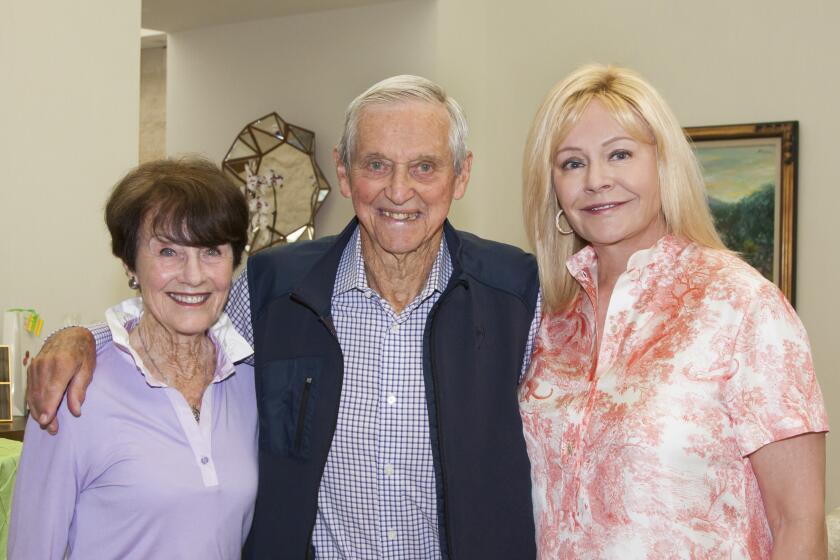 Joy and Roy Emerson with Britt Meyer, hostess of the event, launching the Emerson Tennis Classic.