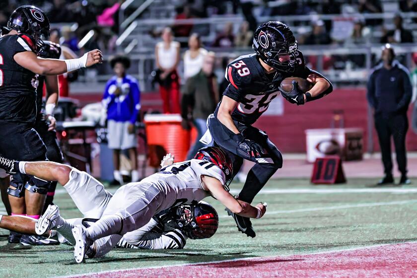 Braylin Drake of Corona Centennial had a big night rushing against Murrieta Valley.