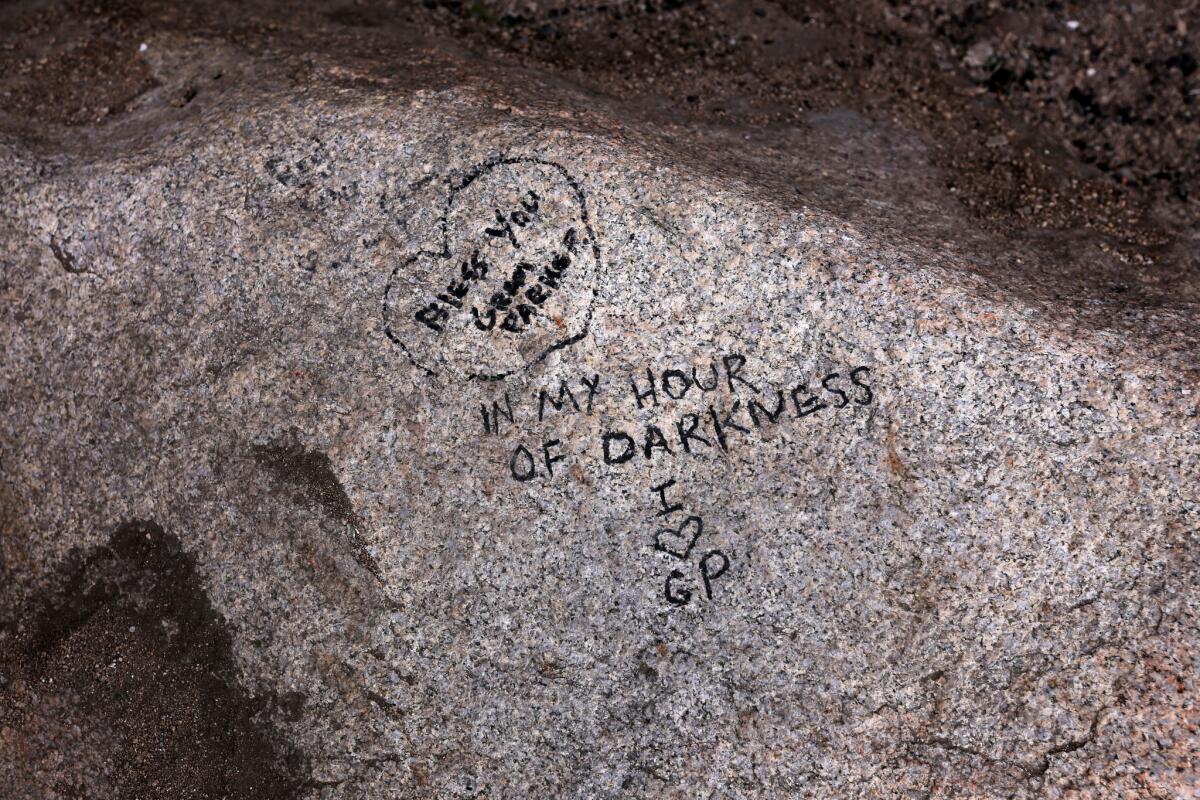 Rocks defaced by graffiti in the Cap Rock area of Joshua Tree National Park. The park is one of many wilderness areas struggling to curtail vandalism.