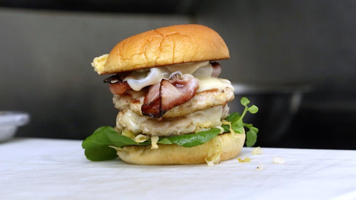 Curtis Stone will be making the Gwen chicken burger as a collaboration with NoMad food truck in March.