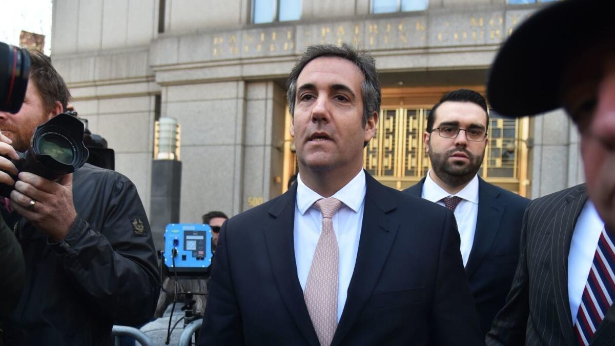 Michael Cohen, President Trump's personal lawyer, leaves a federal courthouse in New York on Thursday.