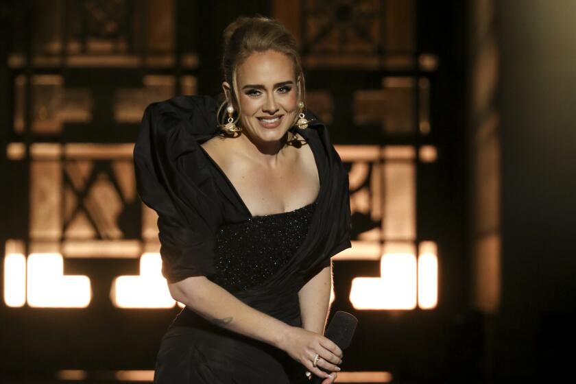 Adele performs at the Griffith Observatory