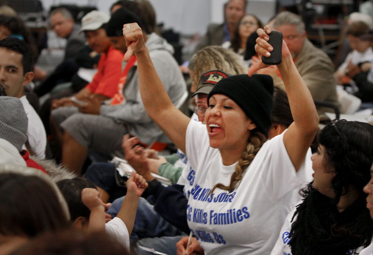 Emotions ran high in March 2013 during a public hearing for a $500-million rail yard planned near low-income, mostly minority neighborhoods in west Long Beach.