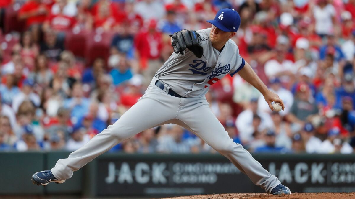 Los Angeles Dodgers starting pitcher Alex Wood throws in the first inning of a baseball game against the Cincinnati Reds on June 16.