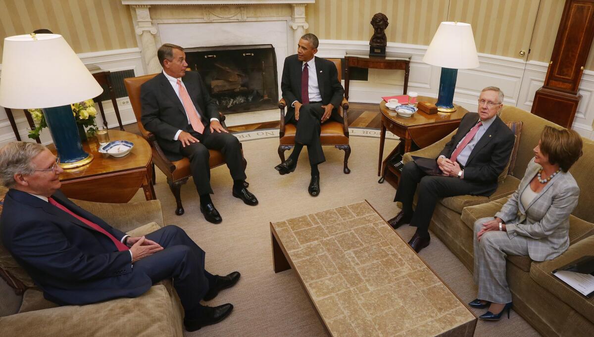 President Obama meets with, from left, Senate Minority Leader Mitch McConnell (R-Ky.), House Speaker John A. Boehner (R-Ohio), Senate Majority Leader Harry Reid (D-Nev.) and House Minority Leader Nancy Pelosi (D-San Francisco) in the Oval Office.