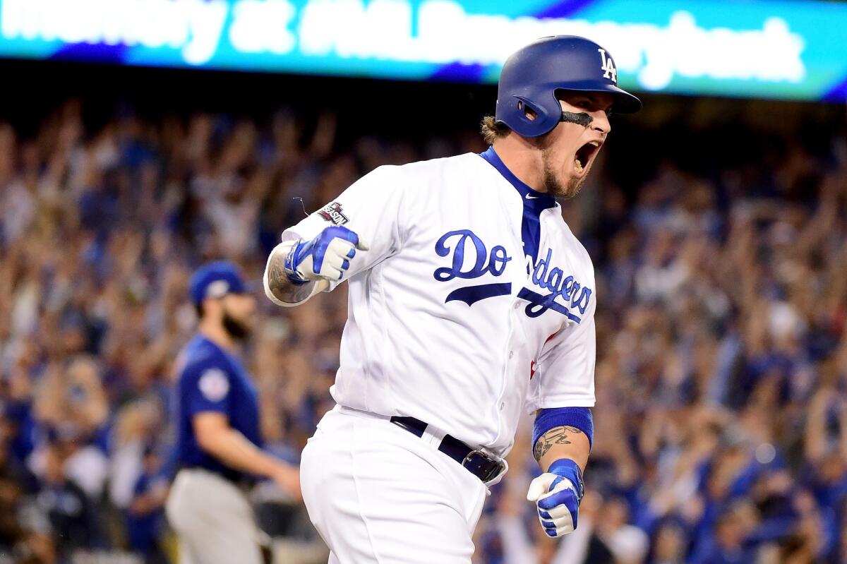 Yasmani Grandal is pumped after hitting a two-run homer in Game 3.