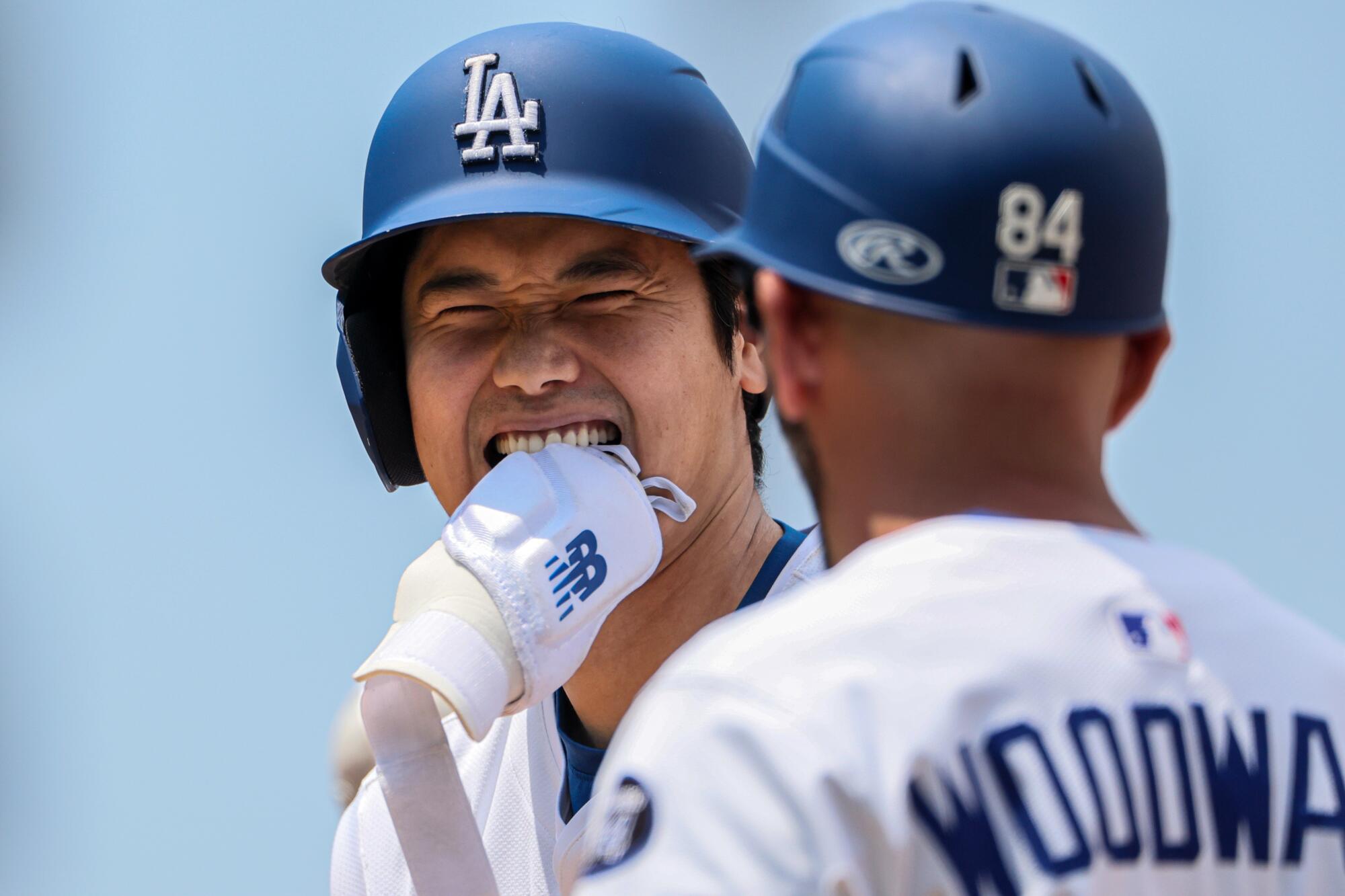 A photo of Shohei Ohtani in uniform wearing a batting helmet.