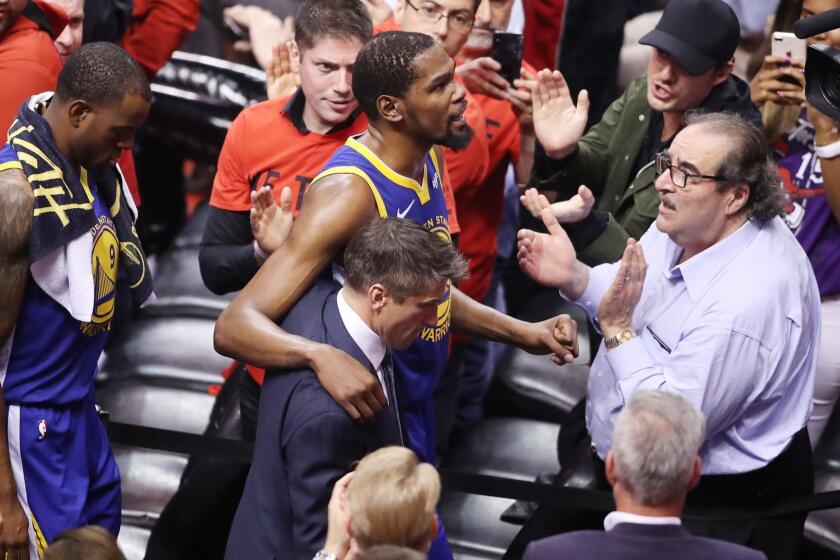 TORONTO, ONTARIO - JUNE 10: Kevin Durant #35 of the Golden State Warriors is assisted off the court after sustaining an injury in the first half against the Toronto Raptors during Game Five of the 2019 NBA Finals at Scotiabank Arena on June 10, 2019 in Toronto, Canada. NOTE TO USER: User expressly acknowledges and agrees that, by downloading and or using this photograph, User is consenting to the terms and conditions of the Getty Images License Agreement. (Photo by Claus Andersen/Getty Images) ** OUTS - ELSENT, FPG, CM - OUTS * NM, PH, VA if sourced by CT, LA or MoD **