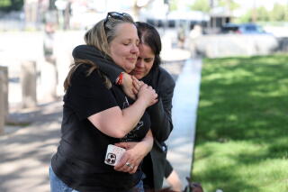 two women hug