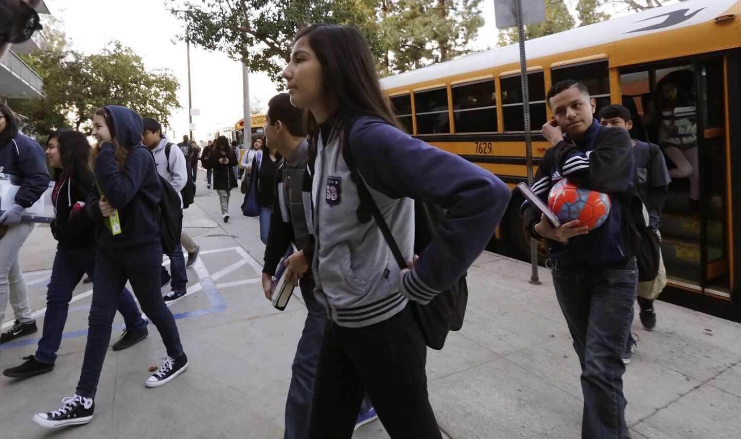 Students return to Franklin High School in Highland Park on Wednesday, a day after all LAUSD campuses were closed by a threat.