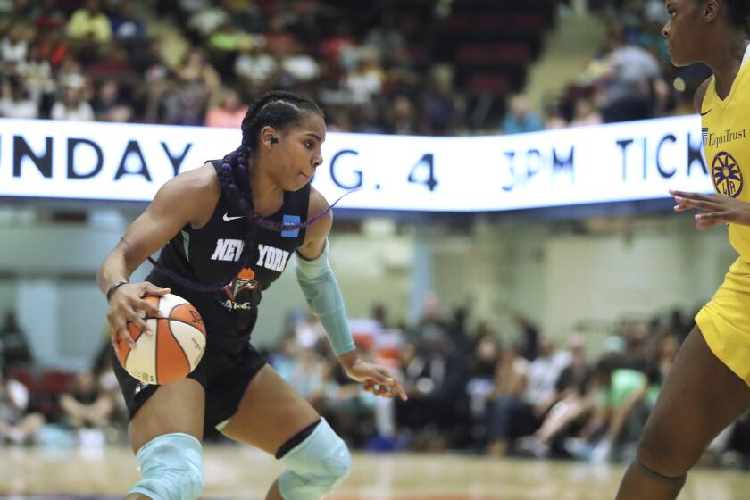 New York Liberty's Reshanda Gray #12 in action against the Los Angeles Sparks during a WNBA basketball game, Saturday, July 20, 2019, in White Plains, N.Y. The Liberty won the game 83-78. (AP Photo/Gregory Payan)