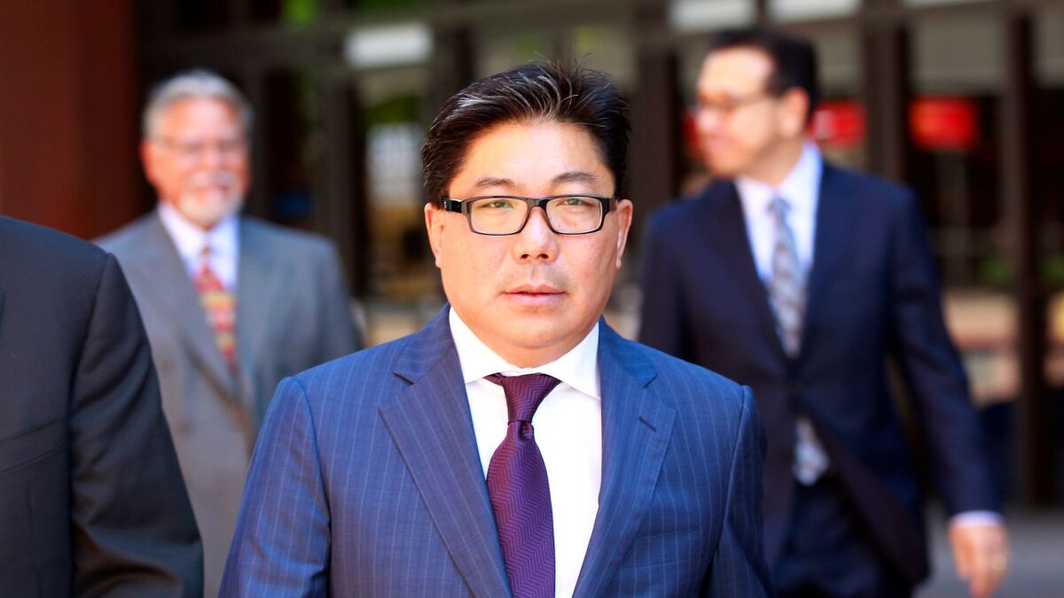 Wealthy Mexican businessman José Susumo Azano walks out of federal court in downtown San Diego after an August 2014 hearing. (K.C. Alfred / San Diego Union-Tribune)