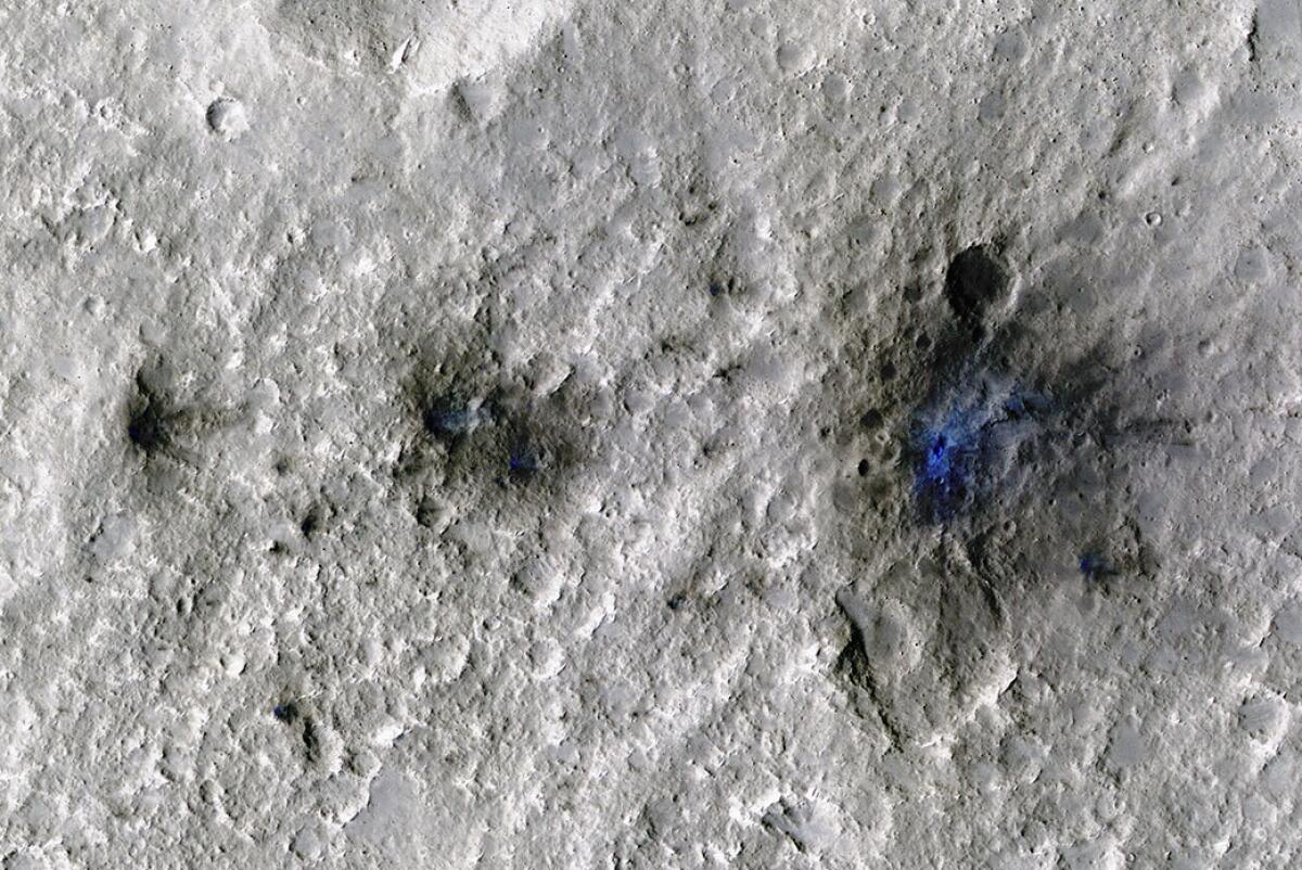 Craters on Mars are seen from space.