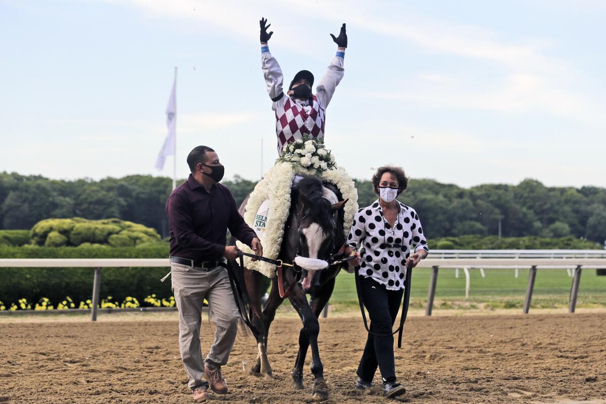 Jockey Manny Franco reacts after winning the Belmont Stakes aboard Tiz the Law on June 20, 2020, in Elmont, N.Y.